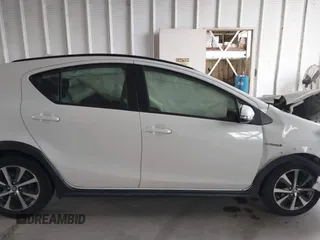 2018 Toyota Prius One with VIN JTDKDTB31J1608112, listed as a IAAI auction lot 42086063 with 51,847 mi miles and . Bid and sale history available at DreamBid. Image 13.
