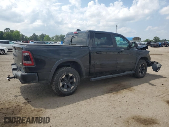 2019 Ram 1500 Rebel z VIN 1C6SRFLT8KN618140, wystawiony jako Copart lot #54734815 z przebiegiem 145 040 mil mil oraz Szkoda całkowita • Salvage title. Historia ofert i sprzedaży dostępna na DreamBid. Obrazek 3.