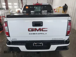 2021 GMC Canyon 4WD Denali with VIN 1GTG6EEN0M1229180, listed as a IAAI auction lot 41298304 with 55,865 mi miles. Bid and sale history available at carsss.com. Image 17.