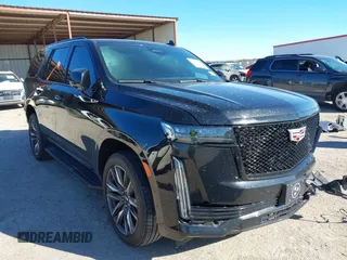 2021 Cadillac Escalade Sport z VIN 1GYS4EKL9MR279767, wystawiony jako IAAI lot #40908713 z przebiegiem 60 806 mil mil oraz . Historia ofert i sprzedaży dostępna na DreamBid. Obrazek 1.