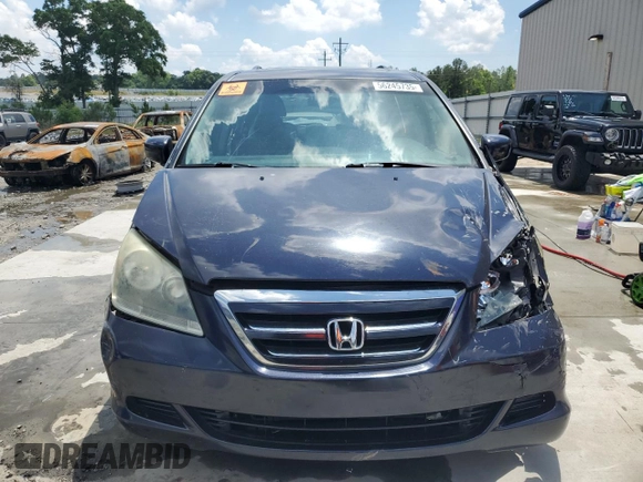 2005 Honda Odyssey EX-L z VIN 5FNRL38775B014777, wystawiony jako Copart lot #56245735 z przebiegiem 222 798 mil mil oraz Szkoda całkowita • Salvage title. Historia ofert i sprzedaży dostępna na DreamBid. Obrazek 5.
