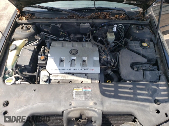 2001 Cadillac Seville Touring STS z VIN 1G6KY54961U257426, wystawiony jako Copart lot #45269275 z przebiegiem 177 990 mil mil oraz Nie do naprawy • Non repairable. Historia ofert i sprzedaży dostępna na DreamBid. Obrazek 13.