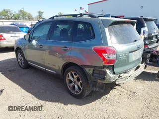 2016 Subaru Forester 2.5i Touring with VIN JF2SJAVC0GH460559, listed as a IAAI auction lot 41829487 with 115,855 mi miles. Bid and sale history available at carsss.com. Image 3.
