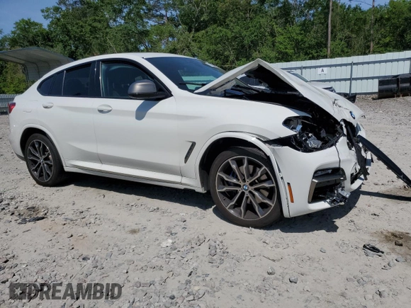 2019 BMW X4 M40i z VIN 5UXUJ5C57KLJ63215, wystawiony jako Copart lot #55150835 z przebiegiem Nie podano mil oraz Szkody całkowita. Historia ofert i sprzedaży dostępna na DreamBid. Obrazek 4.