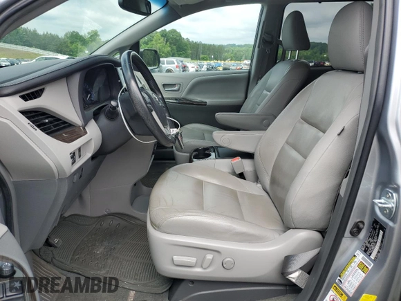 2016 Toyota Sienna XLE with VIN 5TDYK3DC8GS715148, listed as a Copart auction lot 57834045 with 128,769 mi miles and Salvage title. Bid and sale history available at DreamBid. Image 7.