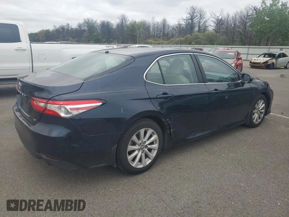 2018 Toyota Camry LE с VIN 4T1B11HK7JU643274, выставлен на аукционе Copart как лот 57064245 с пробегом 162 857 миль миль и Чистый • Clean title. История ставок и продаж доступна на DreamBid. Изображение 3.