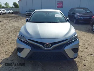 2018 Toyota Camry LE z VIN JTNB11HK7J3045966, wystawiony jako IAAI lot #42069246 z przebiegiem 138 960 mil mil oraz . Historia ofert i sprzedaży dostępna na DreamBid. Obrazek 12.