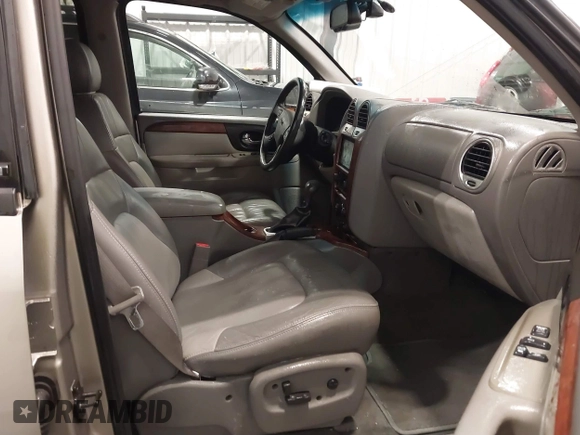 2003 GMC Envoy SLT with VIN 1GKDT13S932395367, listed as a IAAI auction lot 41544810 with 142,012 mi miles. Bid and sale history available at carsss.com. Image 5.