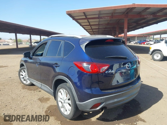2014 Mazda CX-5 Grand Touring with VIN JM3KE2DY2E0349343, listed as a IAAI auction lot 41725214 with 271,094 mi miles. Bid and sale history available at carsss.com. Image 3.