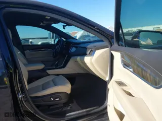 2017 Cadillac XT5 FWD with VIN 1GYKNARS3HZ122969, listed as a IAAI auction lot 41421230 with 116,603 mi miles. Bid and sale history available at carsss.com. Image 5.