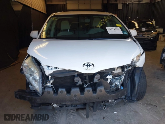 2014 Toyota Sienna LE AAS with VIN 5TDKK3DCXES499628, listed as a IAAI auction lot 42574730 with 110,532 mi miles and . Bid and sale history available at DreamBid. Image 6.