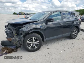 2018 Toyota RAV4 XLE with VIN 2T3RFREV5JW791668, listed as a Copart auction lot 57069665 with 92,197 mi miles and Salvage title. Bid and sale history available at DreamBid. Image 1.
