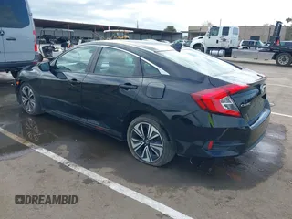 2016 Honda Civic Sedan EX-L with VIN 19XFC1F78GE201822, listed as a IAAI auction lot 41882529 with 142,589 mi miles. Bid and sale history available at carsss.com. Image 3.