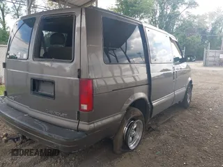 1999 Chevrolet Astro z VIN 1GNDM19W6XB162935, wystawiony jako IAAI lot #42230563 z przebiegiem 317 204 mil mil oraz . Historia ofert i sprzedaży dostępna na DreamBid. Obrazek 4.