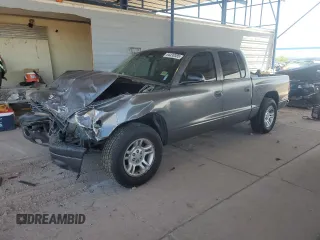 2001 Dodge Dakota Sport z VIN 1B7HL2AN21S298590, wystawiony jako Copart lot #54430385 z przebiegiem 175 365 mil mil oraz Szkoda całkowita • Salvage title. Historia ofert i sprzedaży dostępna na DreamBid. Obrazek 1.