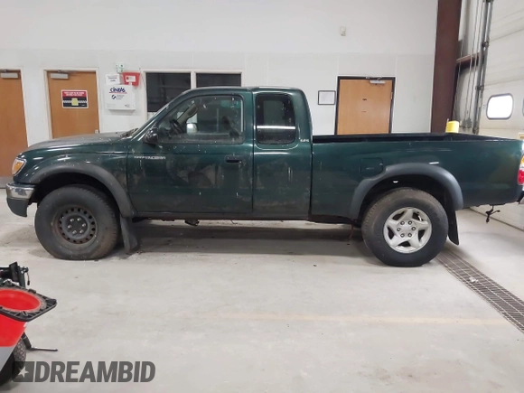 2003 Toyota Tacoma with VIN 5TEWN72N03Z166634, listed as a IAAI auction lot 41987641 with Not Provided miles. Bid and sale history available at carsss.com. Image 14.