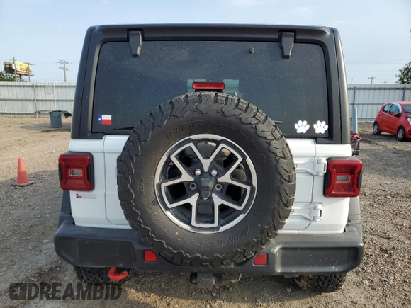 2024 Jeep Wrangler Rubicon with VIN 1C4PJXFG9RW280570, listed as a Copart auction lot 54519055 with 10,638 mi miles and Salvage title. Bid and sale history available at DreamBid. Image 6.