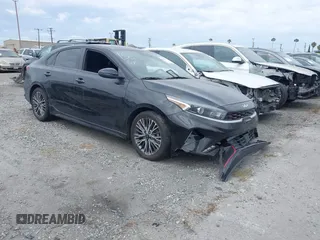 2023 Kia Forte GT-Line z VIN 3KPF54AD8PE539617, wystawiony jako IAAI lot #41890617 z przebiegiem 26 855 mil mil oraz . Historia ofert i sprzedaży dostępna na DreamBid. Obrazek 1.