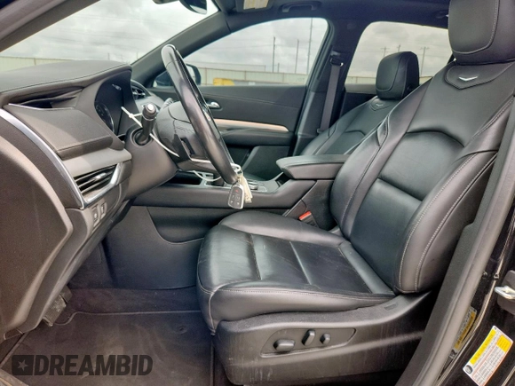 2020 Cadillac XT4 FWD Premium Luxury with VIN 1GYFZCR40LF073517, listed as a Copart auction lot 60121635 with 79,450 mi miles and Salvage title. Bid and sale history available at DreamBid. Image 7.