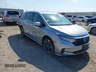 2023 Honda Odyssey Elite z VIN 5FNRL6H95PB063398, wystawiony jako IAAI lot #41825447 z przebiegiem 21 312 mil mil oraz . Historia ofert i sprzedaży dostępna na DreamBid. Obrazek 1.