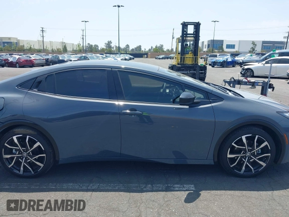 2024 Toyota Prius SE z VIN JTDACACU1R3033326, wystawiony jako IAAI lot #42174204 z przebiegiem 11 273 mil mil oraz . Historia ofert i sprzedaży dostępna na DreamBid. Obrazek 14.