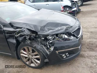 2015 Kia Optima SX Turbo with VIN 5XXGR4A69FG365072, listed as a IAAI auction lot 42295872 with 121,269 mi miles and . Bid and sale history available at DreamBid. Image 6.