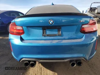2016 BMW M2 with VIN WBS1H9C52GV351930, listed as a Copart auction lot 86610764 with 55,473 mi miles and Salvage Title. Bid and sale history available at carsss.com. Image 6.