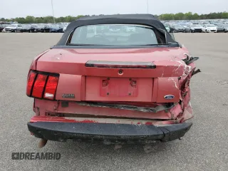2001 Ford Mustang Deluxe с VIN 1FAFP444X1F234869, выставлен на аукционе Copart как лот 57380035 с пробегом 84 074 миль миль и Списание • Salvage title. История ставок и продаж доступна на DreamBid. Изображение 6.