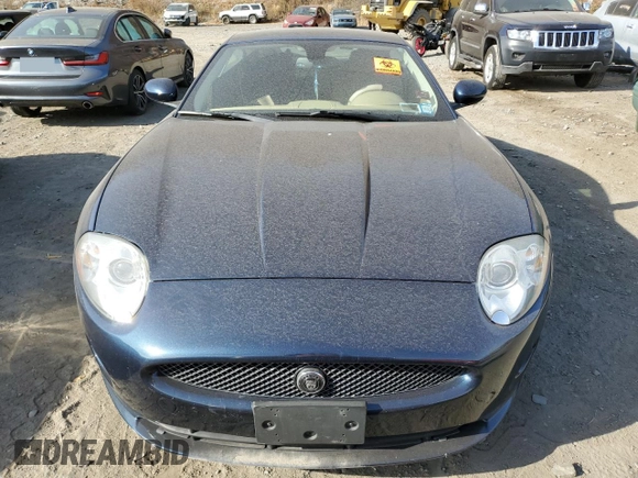 2009 Jaguar XK with VIN SAJWA43B995B30780, listed as a Copart auction lot 79119264 with 0 mi miles and Salvage Title. Bid and sale history available at carsss.com. Image 5.