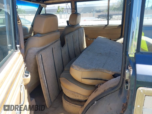 1988 Jeep Grand Wagoneer с VIN 1JCNJ15U8JT173185, выставлен на аукционе IAAI как лот 42337939 с пробегом 240 040 миль миль и . История ставок и продаж доступна на DreamBid. Изображение 8.