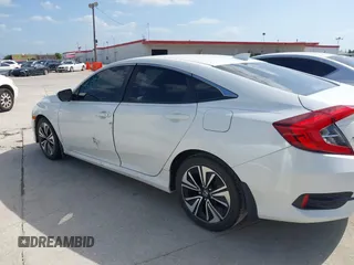 2017 Honda Civic EX-L z VIN 19XFC1F78HE008832, wystawiony jako IAAI lot #42455986 z przebiegiem 103 466 mil mil oraz . Historia ofert i sprzedaży dostępna na DreamBid. Obrazek 14.