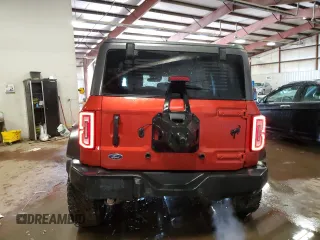 2023 Ford Bronco z VIN 1FMEE5DP1PLB74756, wystawiony jako Copart lot #46458355 z przebiegiem 23 744 mil mil oraz Szkoda całkowita • Salvage title. Historia ofert i sprzedaży dostępna na DreamBid. Obrazek 6.