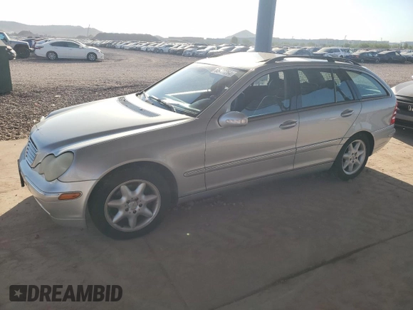 2004 Mercedes-Benz C 240 with VIN WDBRH61J64F464874, listed as a Copart auction lot 65477264 with 184,239 mi miles and Salvage title. Bid and sale history available at DreamBid. Image 1.
