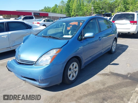 2007 Toyota Prius with VIN JTDKB20U077599601, listed as a IAAI auction lot 42133497 with 224,099 mi miles and . Bid and sale history available at DreamBid. Image 2.