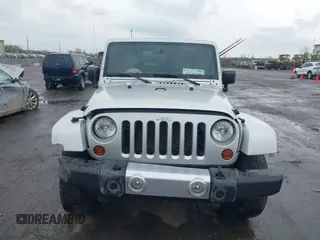 2010 Jeep Wrangler Sahara с VIN 1J4AA5D10AL166398, выставлен на аукционе IAAI как лот 42144530 с пробегом 140 020 миль миль и . История ставок и продаж доступна на DreamBid. Изображение 12.