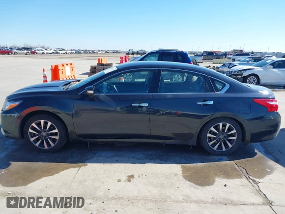 2017 Nissan Altima SR z VIN 1N4AL3AP4HC205670, wystawiony jako IAAI lot #41613157 z przebiegiem 153 600 mil mil oraz . Historia ofert i sprzedaży dostępna na DreamBid. Obrazek 14.