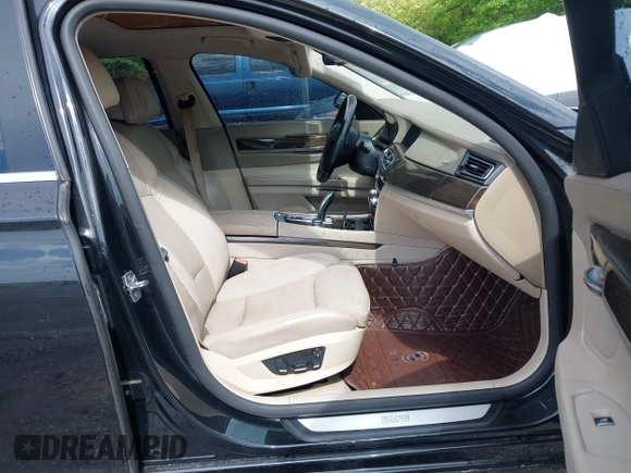 2011 BMW 7 Series 740Li with VIN WBAKB4C5XBC392890, listed as a IAAI auction lot 42108817 with 162,874 mi miles. Bid and sale history available at carsss.com. Image 5.