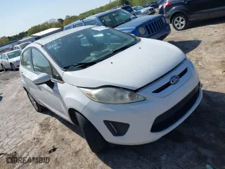2012 Ford Fiesta SE with VIN 3FADP4EJ1CM155329, listed as a IAAI auction lot 41940319 with 218,300 mi miles. Bid and sale history available at carsss.com. Image 1.