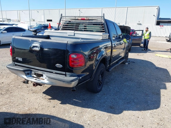 2003 Ford F-150 XLT with VIN 1FTRW07L43KB05221, listed as a IAAI auction lot 41762332 with 226,660 mi miles. Bid and sale history available at carsss.com. Image 4.