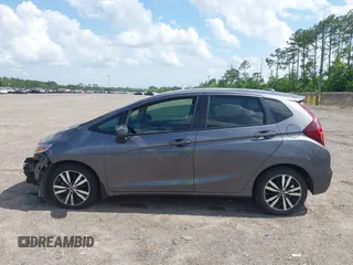 2019 Honda Fit EX z VIN 3HGGK5H89KM736677, wystawiony jako IAAI lot #42443401 z przebiegiem 58 559 mil mil oraz . Historia ofert i sprzedaży dostępna na DreamBid. Obrazek 15.