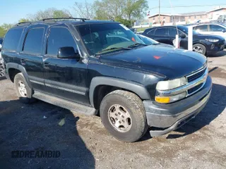 2005 Chevrolet Tahoe LS with VIN 1GNEK13TX5J121977, listed as a IAAI auction lot 42046239 with 165,518 mi miles. Bid and sale history available at carsss.com. Image 1.