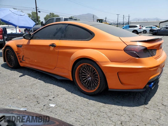 2015 BMW M6 z VIN WBSLX9C56FD160804, wystawiony jako Copart lot #57771054 z przebiegiem 57 699 mil mil oraz Szkody całkowita. Historia ofert i sprzedaży dostępna na DreamBid. Obrazek 2.