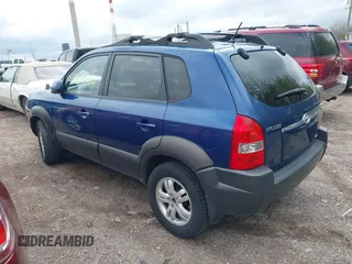 2006 Hyundai Tucson GLS with VIN KM8JN72D36U409525, listed as a IAAI auction lot 42082119 with 142,163 mi miles. Bid and sale history available at carsss.com. Image 3.