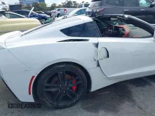 2016 Chevrolet Corvette Z51 3LT z VIN 1G1YM2D76G5116786, wystawiony jako IAAI lot #41815554 z przebiegiem 67 466 mil mil oraz . Historia ofert i sprzedaży dostępna na DreamBid. Obrazek 19.