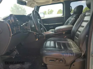 2007 Hummer H2 SUV z VIN 5GRGN23UX7H101776, wystawiony jako Copart lot #56337975 z przebiegiem 176 599 mil mil oraz Szkoda całkowita • Salvage title. Historia ofert i sprzedaży dostępna na DreamBid. Obrazek 7.
