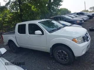 2015 Nissan Frontier S with VIN 1N6AD0EV0FN717018, listed as a IAAI auction lot 42322428 with 104,715 mi miles and . Bid and sale history available at DreamBid. Image 13.