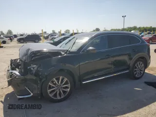 2021 Mazda CX-9 Grand Touring with VIN JM3TCADY5M0518063, listed as a Copart auction lot 61696065 with 90,387 mi miles and Salvage title. Bid and sale history available at DreamBid. Image 1.