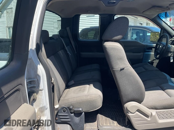2009 Ford F-150 STX with VIN 1FTRX12879FA71573, listed as a Copart auction lot 56188705 with 228,051 mi miles and Clean Title. Bid and sale history available at DreamBid. Image 6.