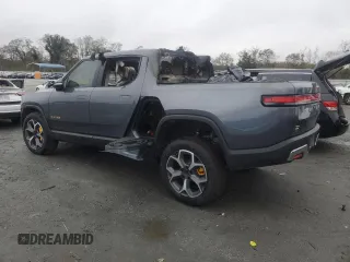 2022 Rivian R1T Adventure z VIN 7FCTGAAA5NN014020, wystawiony jako Copart lot #81367764 z przebiegiem Nie podano mil oraz Szkody całkowita. Historia ofert i sprzedaży dostępna na DreamBid. Obrazek 2.