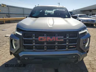 2024 GMC Canyon 4WD AT4 with VIN 1GTP6DEK8R1264699, listed as a Copart auction lot 76604464 with 2,406 mi miles and Salvage Title. Bid and sale history available at carsss.com. Image 5.